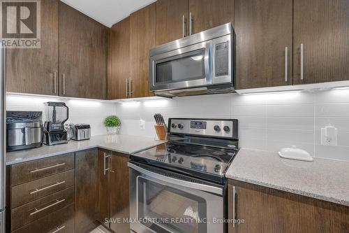 2010 - 3985 Grand Park Drive, Mississauga, ON - Indoor Photo Showing Kitchen With Upgraded Kitchen