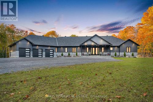 1250 Old Parry Sound Road, Muskoka Lakes, ON - Outdoor With Deck Patio Veranda With Facade