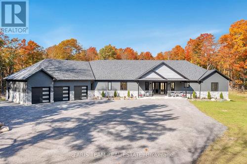 1250 Old Parry Sound Road, Muskoka Lakes, ON - Outdoor With Deck Patio Veranda With Facade