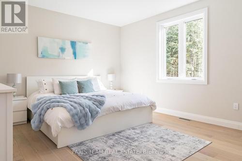 1250 Old Parry Sound Road, Muskoka Lakes, ON - Indoor Photo Showing Bedroom