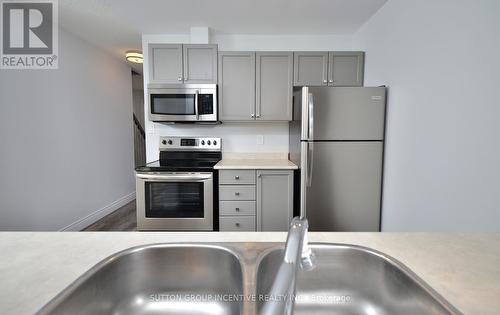 796 Coral Springs Lane, Midland, ON - Indoor Photo Showing Kitchen With Double Sink