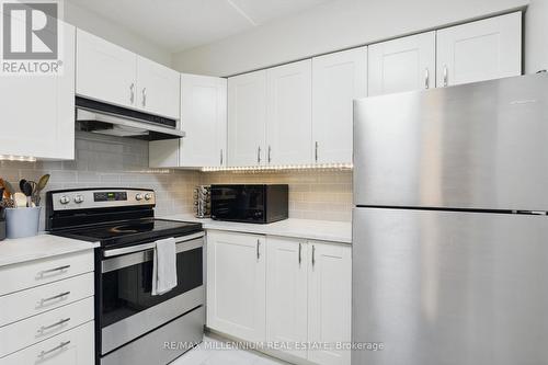 119 - 2030 Cleaver Avenue, Burlington, ON - Indoor Photo Showing Kitchen With Stainless Steel Kitchen