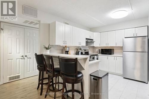 119 - 2030 Cleaver Avenue, Burlington, ON - Indoor Photo Showing Kitchen With Stainless Steel Kitchen