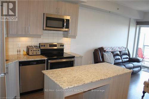 304 - 560 North Service Road, Grimsby, ON - Indoor Photo Showing Kitchen With Stainless Steel Kitchen