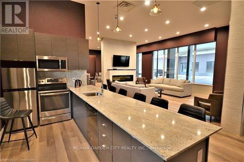 304 - 560 North Service Road, Grimsby, ON - Indoor Photo Showing Kitchen With Stainless Steel Kitchen With Upgraded Kitchen