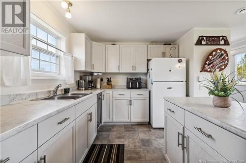 65 Ulysse Drive, Dieppe, NB - Indoor Photo Showing Kitchen With Double Sink