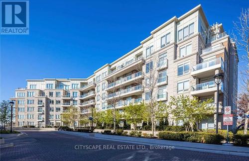 212 - 9 Stollery Pond Crescent N, Markham, ON - Outdoor With Balcony With Facade