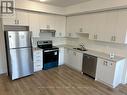 315 - 755 Omega Drive, Pickering, ON  - Indoor Photo Showing Kitchen With Stainless Steel Kitchen With Double Sink 