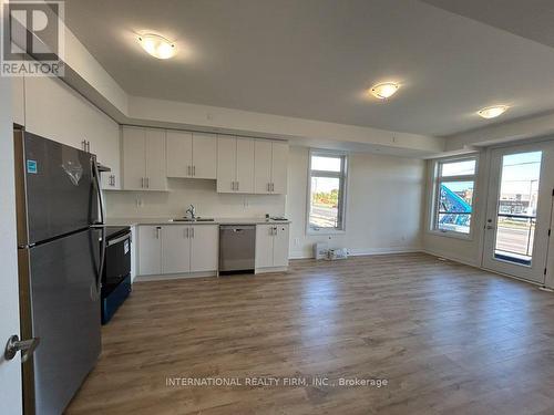 315 - 755 Omega Drive, Pickering, ON - Indoor Photo Showing Kitchen With Stainless Steel Kitchen With Double Sink