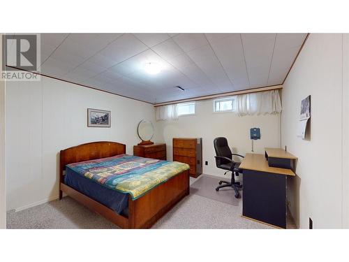 1404 4Th Avenue S, Cranbrook, BC - Indoor Photo Showing Bedroom