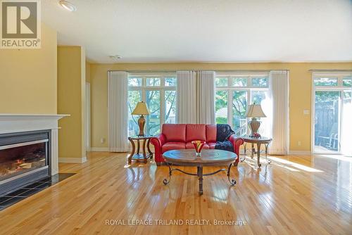 83 - 505 Blue Jay Drive, London, ON - Indoor Photo Showing Living Room With Fireplace