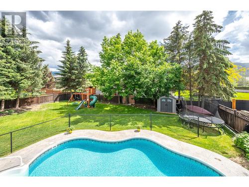 2011 Sandpiper Lane, Penticton, BC - Outdoor With In Ground Pool With Backyard