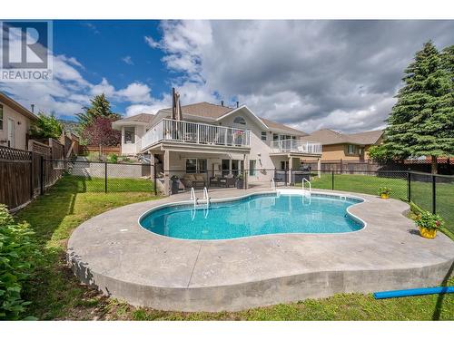 2011 Sandpiper Lane, Penticton, BC - Outdoor With In Ground Pool With Deck Patio Veranda With Backyard