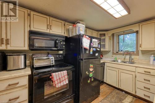 180 King Hiram Street, Ingersoll, ON - Indoor Photo Showing Kitchen With Double Sink