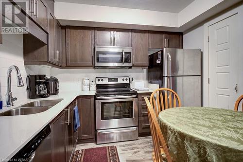 34 Brock Street Unit# 101, Woodstock, ON - Indoor Photo Showing Kitchen With Double Sink