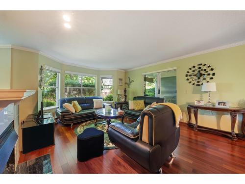 1-34 10050-10090 137A Street, Surrey, BC - Indoor Photo Showing Living Room With Fireplace