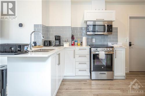 220 Mcarthur Avenue Unit#1, Ottawa, ON - Indoor Photo Showing Kitchen With Double Sink