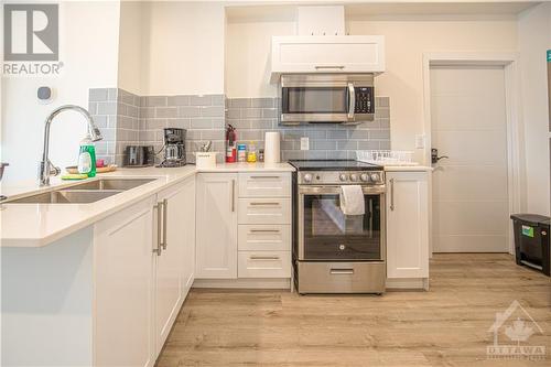 220 Mcarthur Avenue Unit#1, Ottawa, ON - Indoor Photo Showing Kitchen With Double Sink