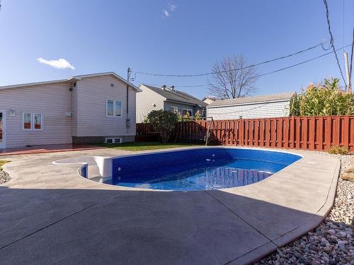 Piscine - 615 Rue Duchesneau, Laval (Saint-François), QC - Outdoor With In Ground Pool