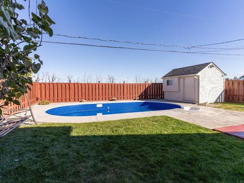 Piscine - 615 Rue Duchesneau, Laval (Saint-François), QC - Outdoor With In Ground Pool