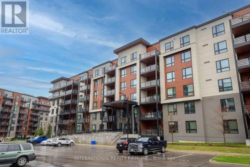 202 - 306 Essa Road, Barrie, ON - Outdoor With Balcony With Facade