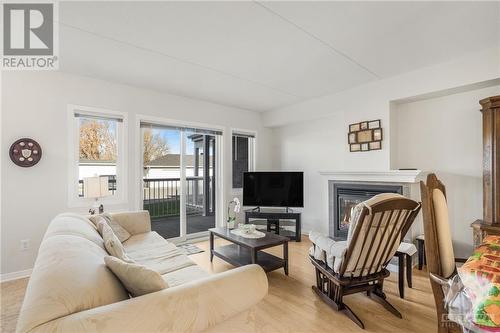 384 Cecile Boulevard Unit#405, Hawkesbury, ON - Indoor Photo Showing Living Room With Fireplace