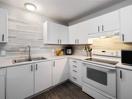 412-3185 Barons Rd, Nanaimo, BC - Indoor Photo Showing Kitchen With Double Sink