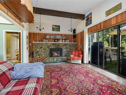 2011 / 2009 Idlemore Rd, Sooke, BC - Indoor Photo Showing Living Room With Fireplace