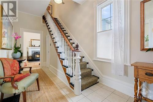 staircase - 33 Napoleon Street, Carleton Place, ON - Indoor Photo Showing Other Room With Fireplace