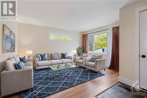 separate suite ~ living room ~ viturally staged - 33 Napoleon Street, Carleton Place, ON - Indoor Photo Showing Living Room