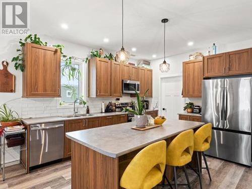 34 Scotia Lane, Whitehorse, YT - Indoor Photo Showing Kitchen With Stainless Steel Kitchen With Double Sink With Upgraded Kitchen