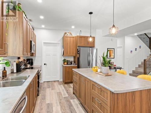 34 Scotia Lane, Whitehorse, YT - Indoor Photo Showing Kitchen With Stainless Steel Kitchen With Double Sink With Upgraded Kitchen