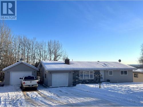 5324 51 Street, Fort Nelson, BC - Outdoor With Facade