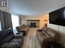 5324 51 Street, Fort Nelson, BC  - Indoor Photo Showing Living Room With Fireplace 