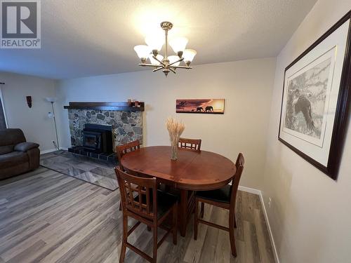 5324 51 Street, Fort Nelson, BC - Indoor Photo Showing Other Room With Fireplace