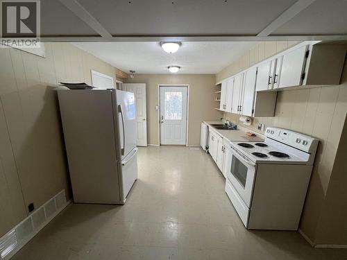 5324 51 Street, Fort Nelson, BC - Indoor Photo Showing Kitchen With Double Sink