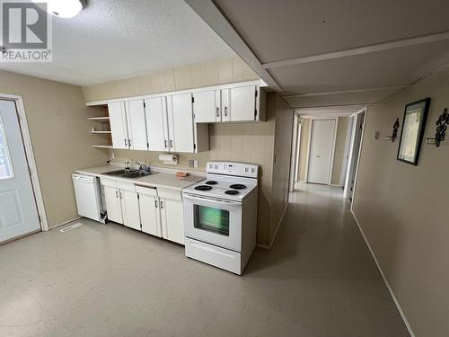 5324 51 Street, Fort Nelson, BC - Indoor Photo Showing Kitchen With Double Sink