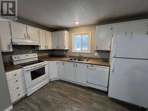 4107 E 53 Avenue, Fort Nelson, BC - Indoor Photo Showing Kitchen With Double Sink