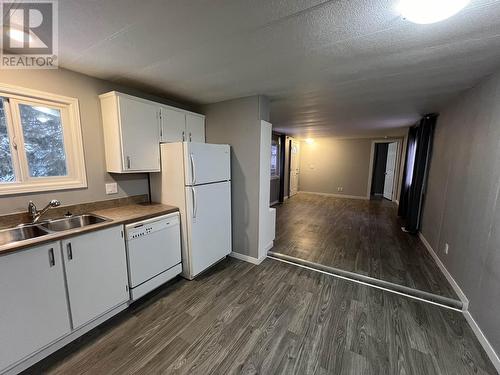 4107 E 53 Avenue, Fort Nelson, BC - Indoor Photo Showing Kitchen With Double Sink