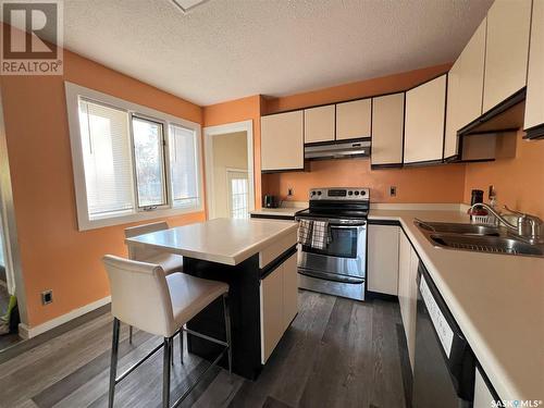 49 21St Street E, Prince Albert, SK - Indoor Photo Showing Kitchen With Stainless Steel Kitchen With Double Sink