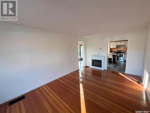 49 21St Street E, Prince Albert, SK - Indoor Photo Showing Other Room With Fireplace