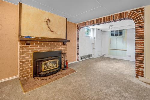 610 Vedette Drive, Penticton, BC - Indoor Photo Showing Living Room With Fireplace