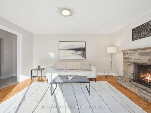 61 Fulbert Cres, Toronto, ON - Indoor Photo Showing Living Room With Fireplace