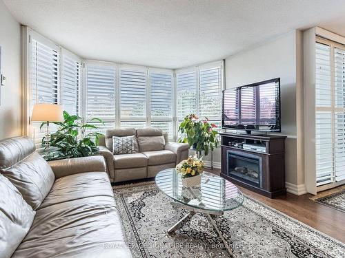 316-1333 Bloor St, Mississauga, ON - Indoor Photo Showing Living Room With Fireplace