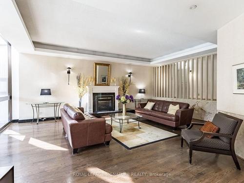 316-1333 Bloor St, Mississauga, ON - Indoor Photo Showing Living Room With Fireplace