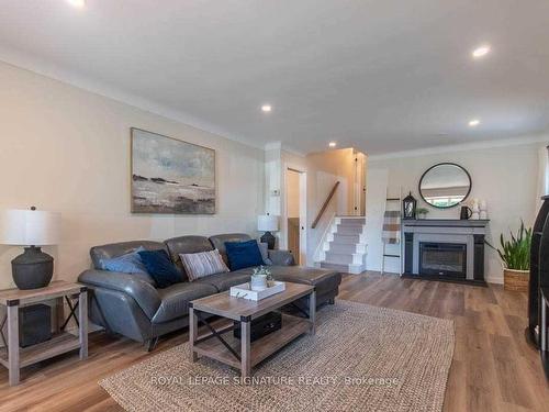 Main-55 Burness Dr, St. Catharines, ON - Indoor Photo Showing Living Room With Fireplace