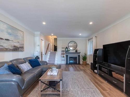 Main-55 Burness Dr, St. Catharines, ON - Indoor Photo Showing Living Room With Fireplace