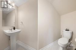 Main level powder room - 