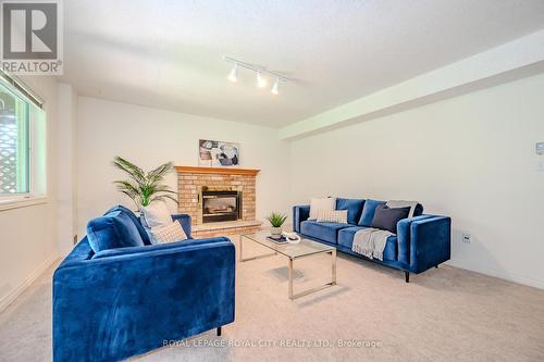 7 Whitetail Court, Guelph, ON - Indoor Photo Showing Living Room With Fireplace