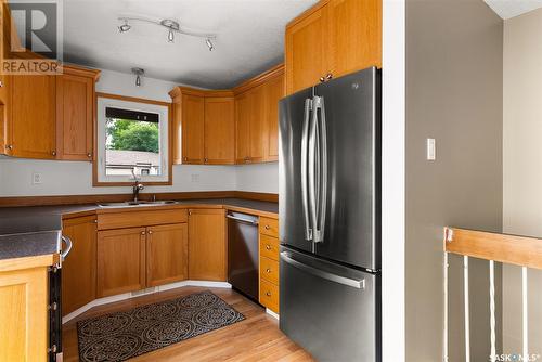 714 Callander Crescent N, Regina, SK - Indoor Photo Showing Kitchen With Stainless Steel Kitchen With Double Sink